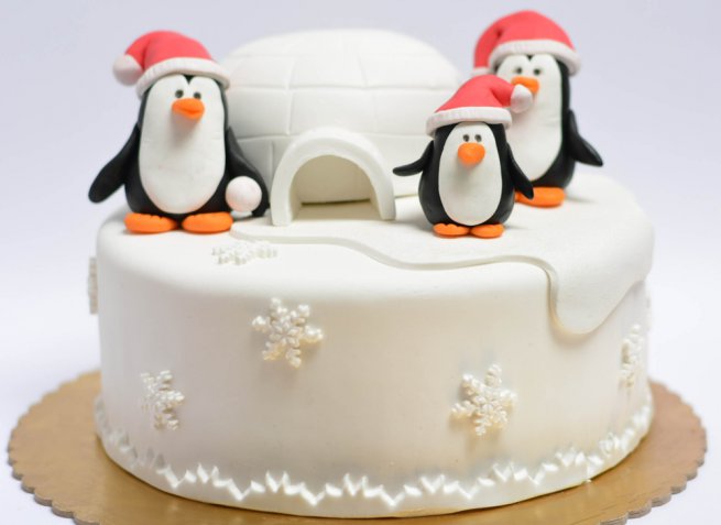 Pinguini in pasta di zucchero, come farli per un cake design simpatico